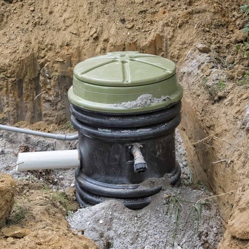 a grinder pump in the ground
