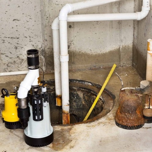 a sewage ejector pump in a basement