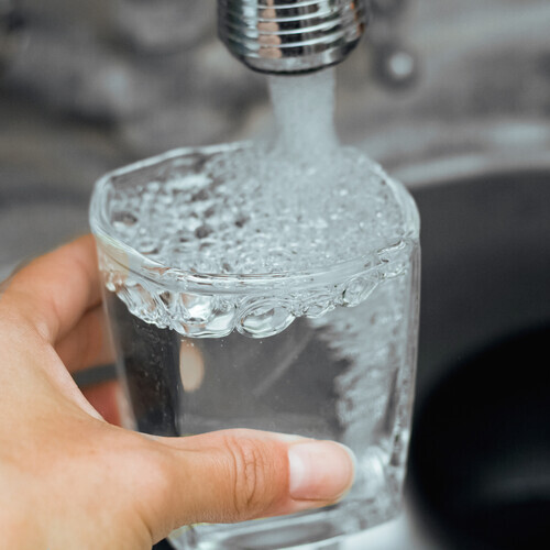 water being poured into a glass